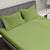 Fern  Colour Bedsheet With 2 Pillows under a Charcoal Colour Bed, 400 TC Bedsheet, Orangic Bedsheet