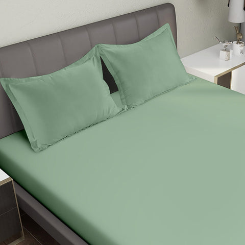 Iceberg Green Colour Bedsheet With 2 Pillows under a Charcoal Colour Bed, 400 TC Bedsheet, Orangic Bedsheet