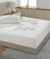 White Colour Bedsheet With Good Furniture & Interior Of The Room 