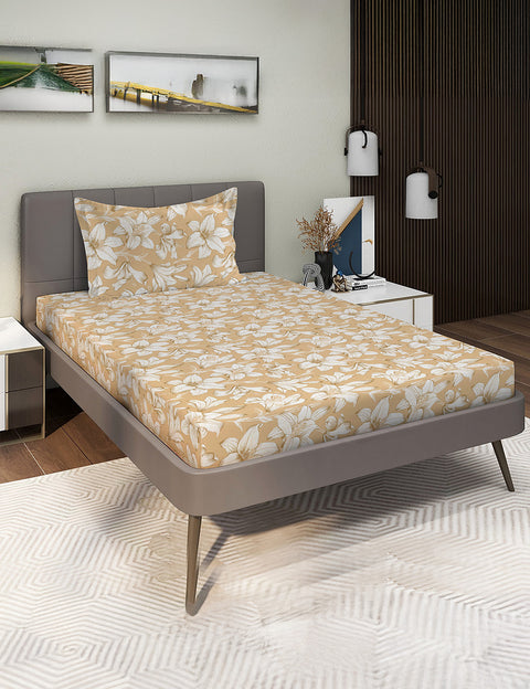 Bed with floral bedding in a modern bedroom setting