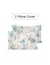 Two floral pillow covers on a white background