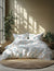Floral bedding set on a bed with sunlight filtering through the window