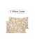 Two beige pillow covers with white floral pattern on a white background