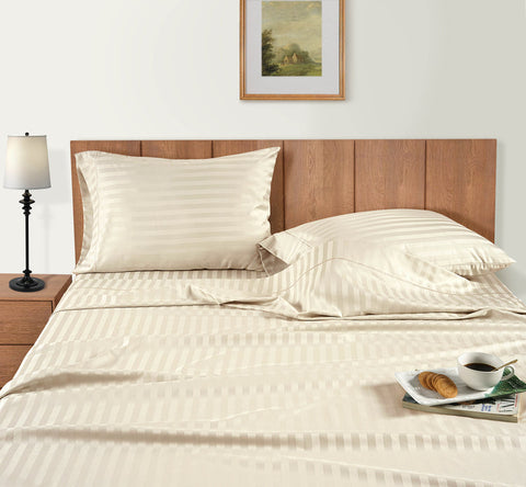 Ivory Colour Bedsheet on the wooden bed with breakfast
