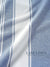 Close-up of blue and white striped fabric with 'Lane Linen' branding.