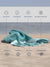 Teal towel on sand with text highlighting features like quick dry, sand proof, breathable, machine washable, absorbent, compact, versatile, and stylish design.
