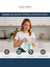 Woman using a kitchen towel in a modern kitchen with 'Lane Linen' branding & features like super soft, durable, skin friendly, highly absorbent Premium Hand Towels For Kitchen