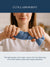 Person holding a blue dish towel with water dripping from it, text about absorbent quality, the high quality cotton fabric used in the manufacturing of our dish towels makes them highly absorbent
