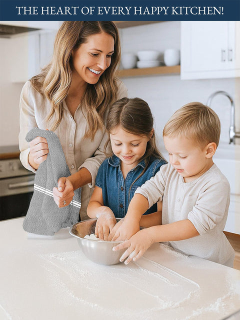 A Woman With Grey Color Kitchen Towel and two children in a kitchen mixing ingredients in a bowl.