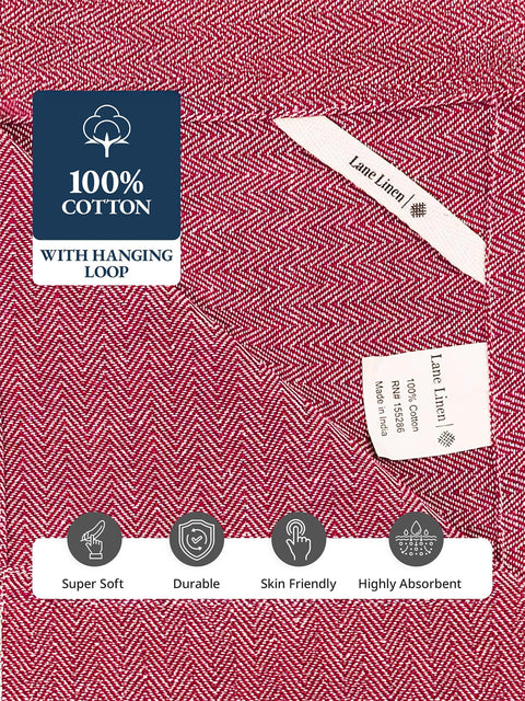 Red herringbone patterned towel with labels and text on a red background