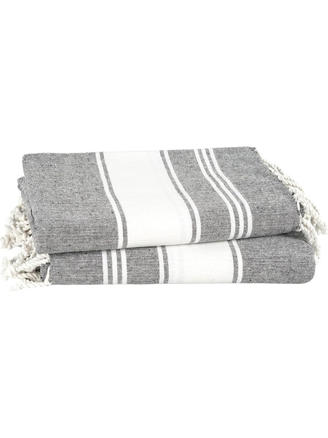 Smoky Black Color and white striped towel with fringes on a white background