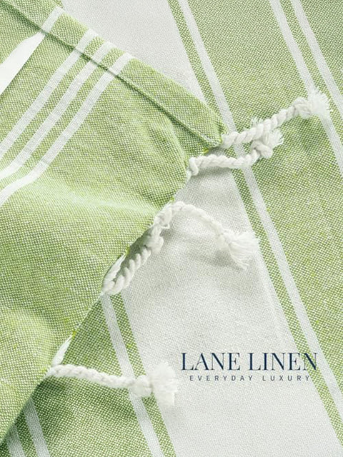 Close-up of Lime and white checkered fabric with 'Lane Linen' branding.