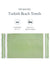 Lime Turkish beach towel with packaging details on a white background