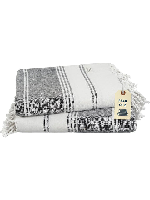 Two folded towels with a tag indicating 'Pack of 2' on a white background