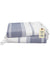 Two blue and white patterned towels stacked with a tag on a white background.