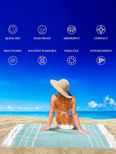 Woman sitting on a beach with a towel, on a beach background by features surrounded i.e quick dry, sand proof, absorbent, compact, breatheable, machine washable, versatile, stylish design