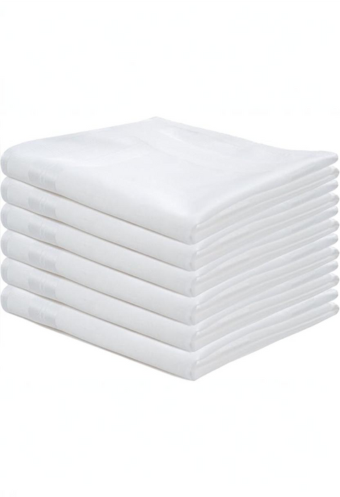 Stack of white towels on a white background