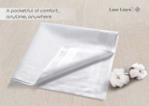 White Handkerchief on a wooden surface with cotton bolls and 'Lane Linen' branding and describing it as a pocketful of comfort, anytime, anywhere