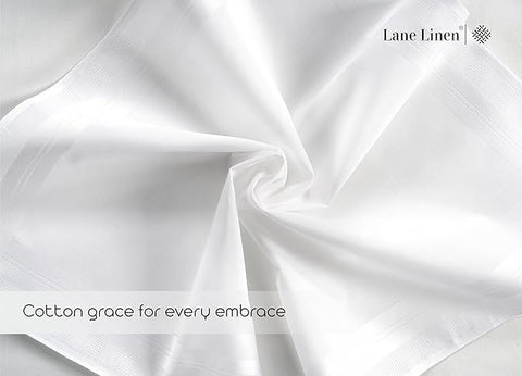 White linen fabric with 'Lane Linen' branding and text of 'Cotton grace for every embrace'.