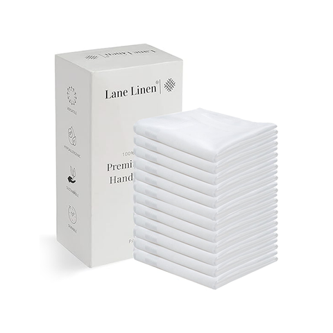 Stack of 12 white hand towels with a Lane Linen box on a white background