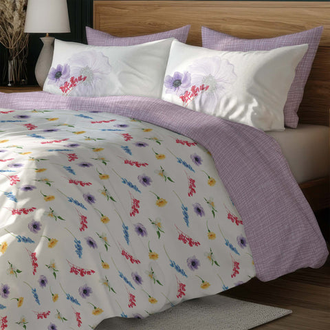 White Yellow Colour Floral Pattern Bedsheet With Pillows On A Wooden Bed