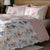 Pink & Blue Floral Colour Bedsheet With 4 Pillows On a Wooden Bed