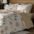 Brown White Floral  Bedsheet With 4 Pillows On A Wooden Bed
