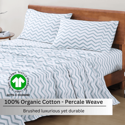 Single bedsheet with 2 pillows on a wooden bed , 100% organic cotton, percale weave, luxurious yet durable bedsheet