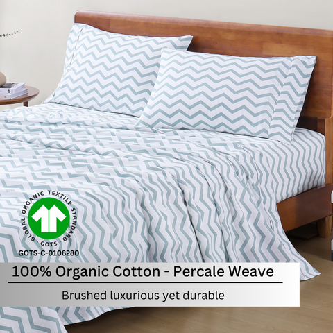 Double size bedsheet with 2 pillows on a wooden bed , 100% organic cotton, percale weave