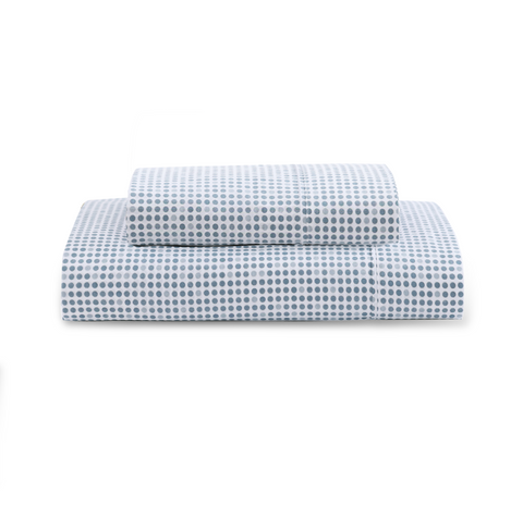 Two Polka Dot Blue Color Bedsheet With A White Background