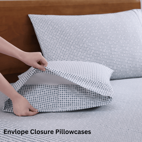 2 Polka Dot Blue Color Pillows with Bedsheet On A Wooden Bed