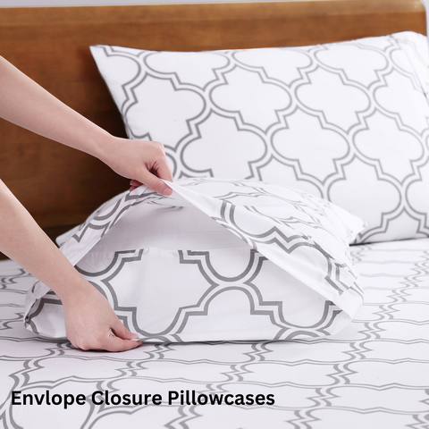 King size bedsheet with white pillows on a wooden bed