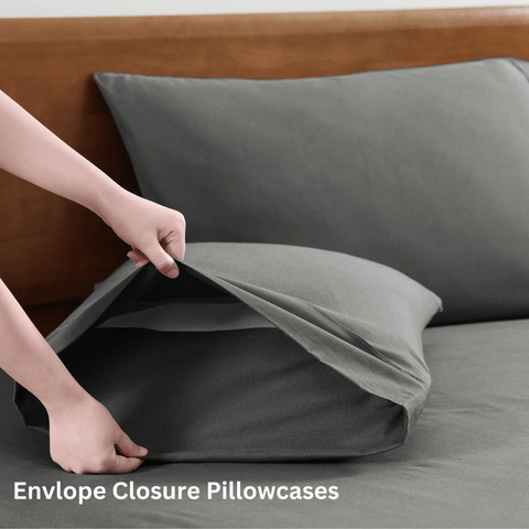 2 Pillows OF Charcoal Color with Bedsheet on a Wooden Bed