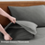 2 Pillows OF Charcoal Color with Bedsheet on a Wooden Bed