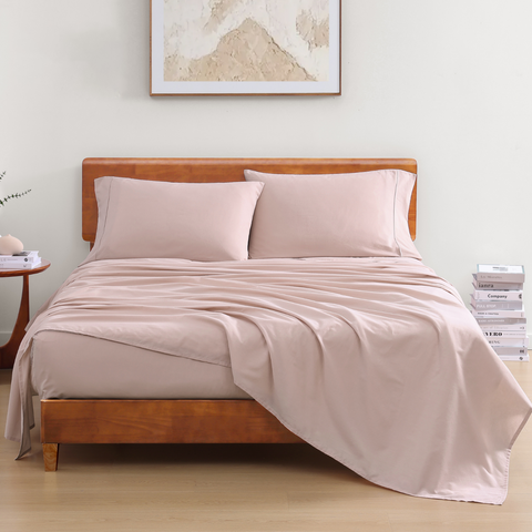 Sephia Rose Colour Bedsheet With 2 Pillows On a wooden Bed