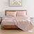 Sephia Rose Colour Bedsheet With 2 Pillows On a wooden Bed