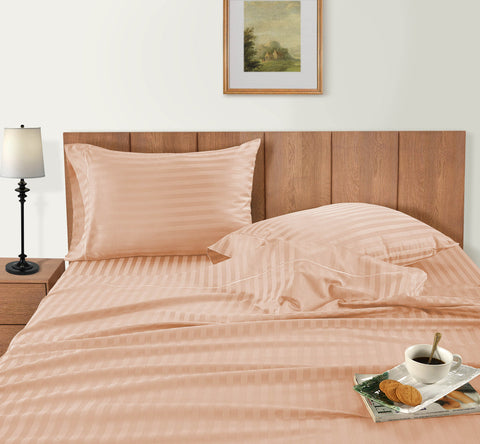 Pale Peach Bedsheet on the wooden bed with breakfast