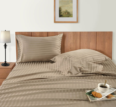 Taupe Colour Bedsheet on the wooden bed with breakfast
